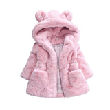 A girl's fur coat for autumn and winter