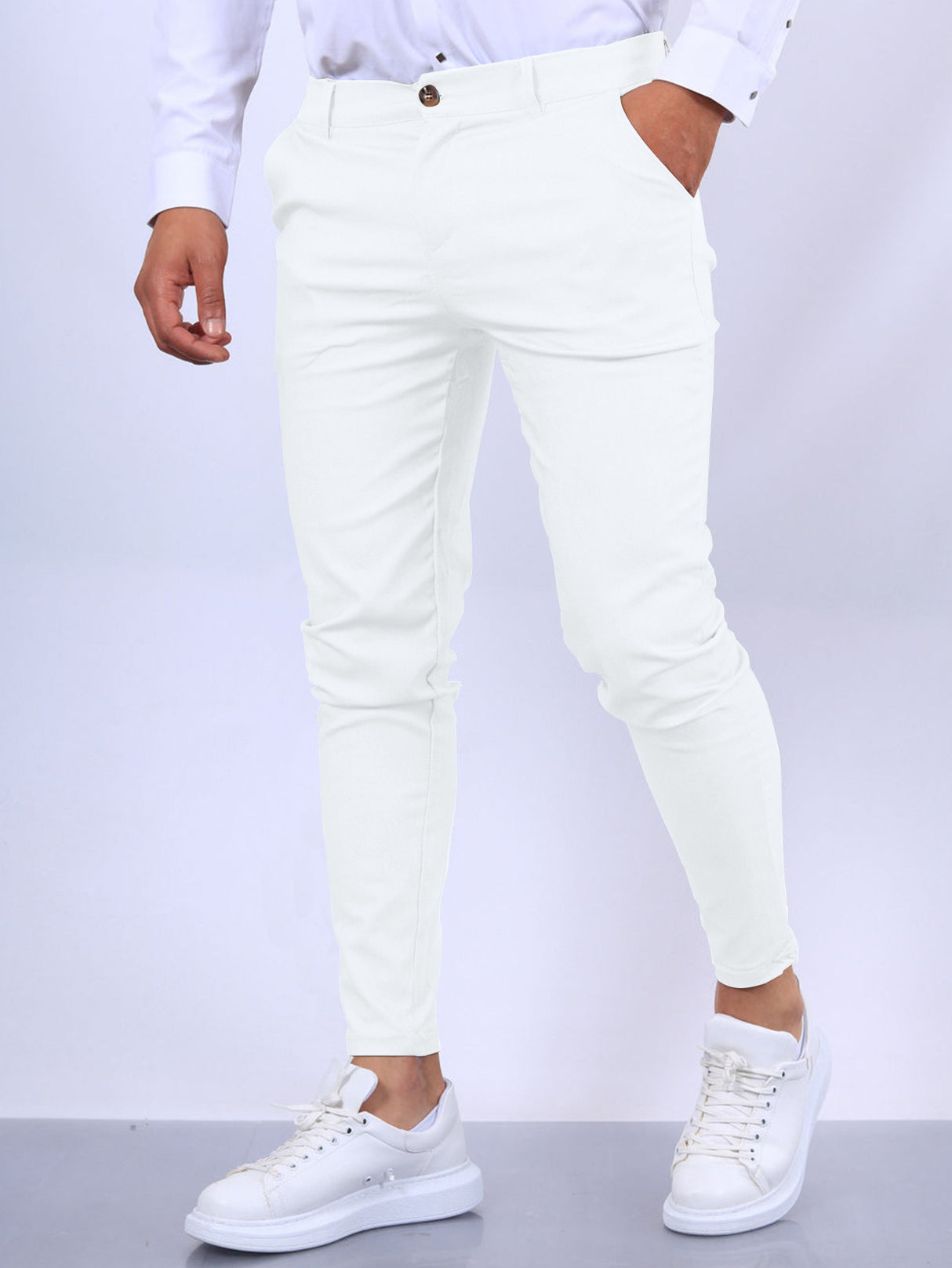 Pantalones tapered casuales con textura de color sólido europeo y americano