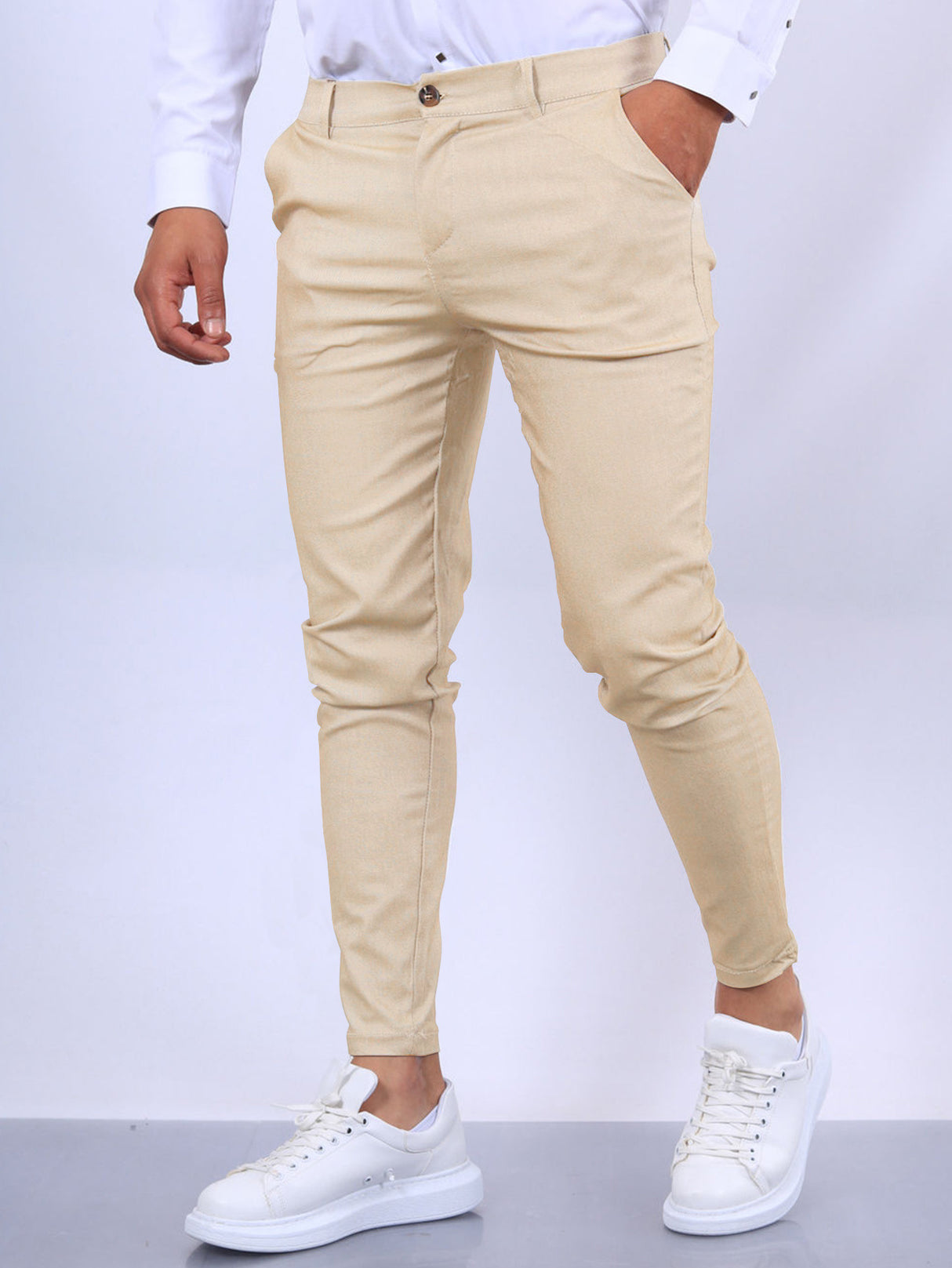 Pantalones tapered casuales con textura de color sólido europeo y americano