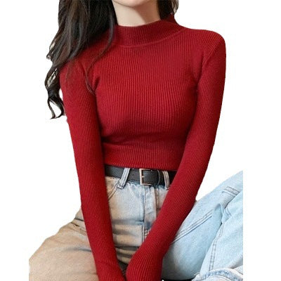 Top de camisa de bajo de punto delgado con medio cuello de Color puro a la moda para mujer