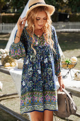 Vestido bohemio con manga globo y cuello anudado